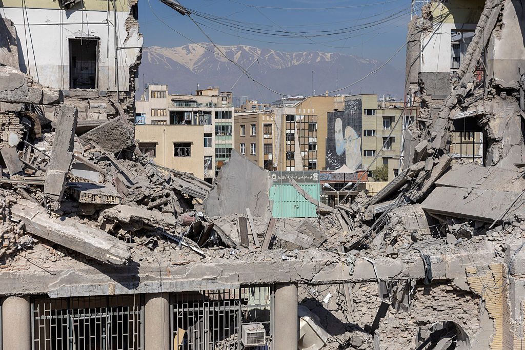 Iran vows no surrender as air strikes hit Tehran airport